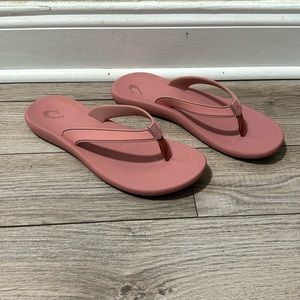 Pink OluKai women’s flip flops size 10.